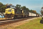 Loaded coal train rolls south